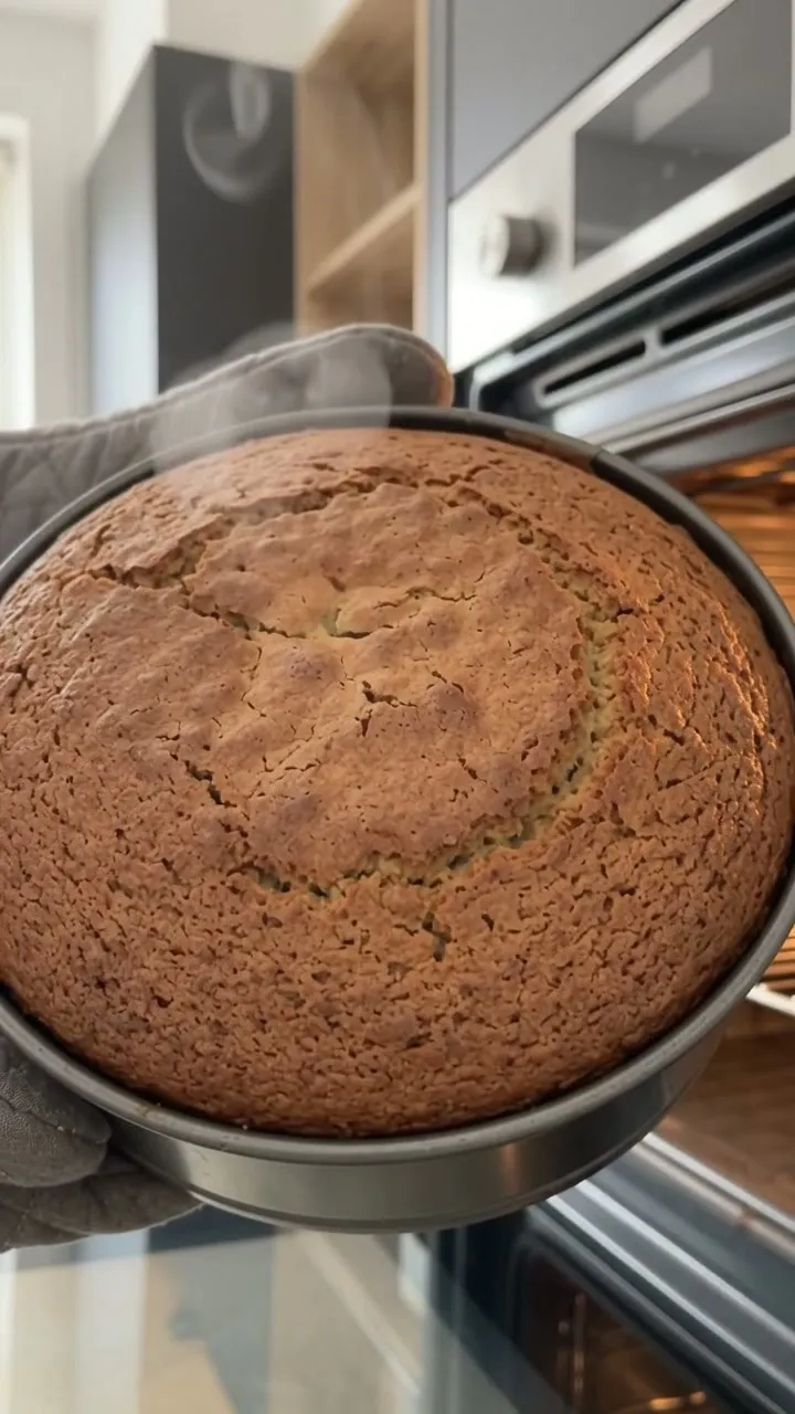 The espresso cake coming out of the oven in its tin